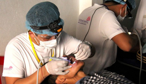 Roomchang mobile dental clinic in Battambang — treating children for free